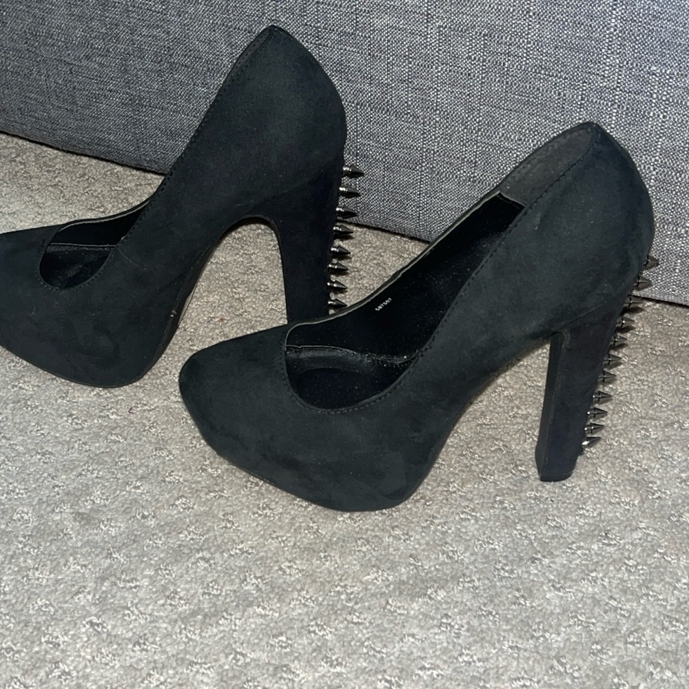 Never worn spike heels.